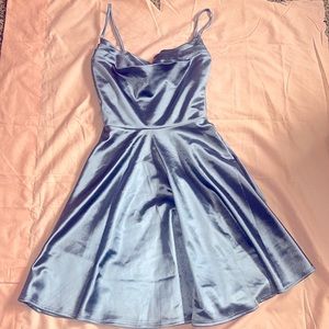 This is a dress from Windsor. It is a dark grey/ blue color and elegant.
